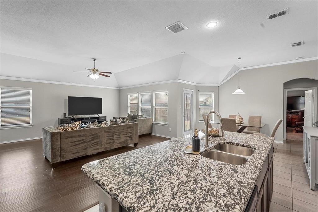1948 Day Break Drive Lancaster, TX 75146 - Photo 10 of 25 a living room with furniture and a flat screen tv