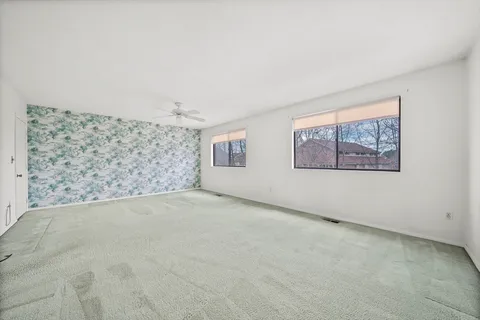 an empty room with windows