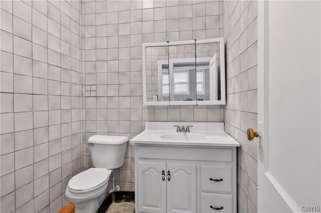 193 Cottage Street Auburn, NY 13021 - Photo 35 of 42 Unit 2 ensuite half bathroom