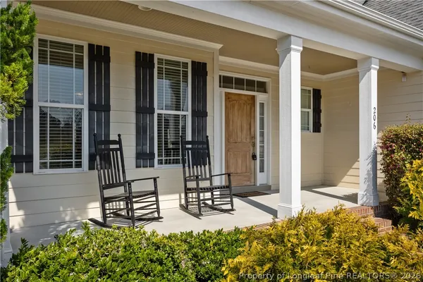 front view of house with a outdoor seating