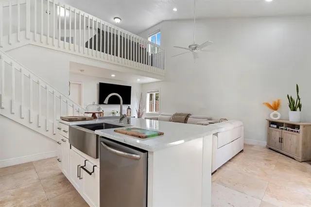 a kitchen with a stove and a sink
