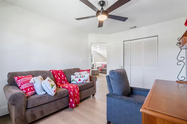 a living room with furniture and a couch