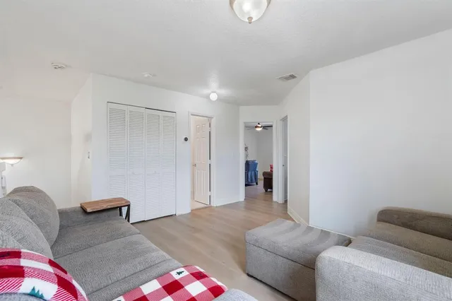 a living room with furniture and a couch