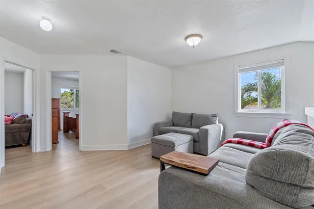 a living room with furniture and a couch
