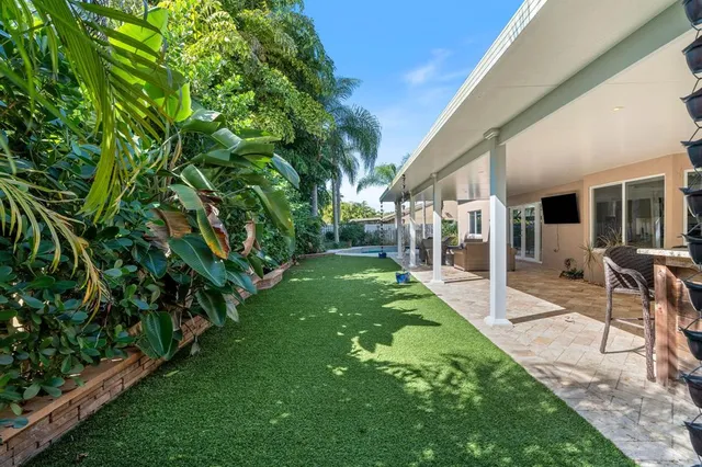 a view of yard with patio