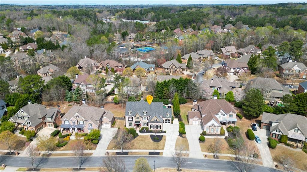 3435 Hidden Shoals Road Northeast Buford, GA 30519 - Photo 103 of 108 an aerial view of multiple house