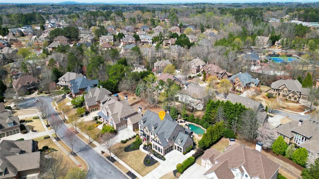 3435 Hidden Shoals Road Northeast Buford, GA 30519 - Photo 104 of 108 an aerial view of residential houses with outdoor space
