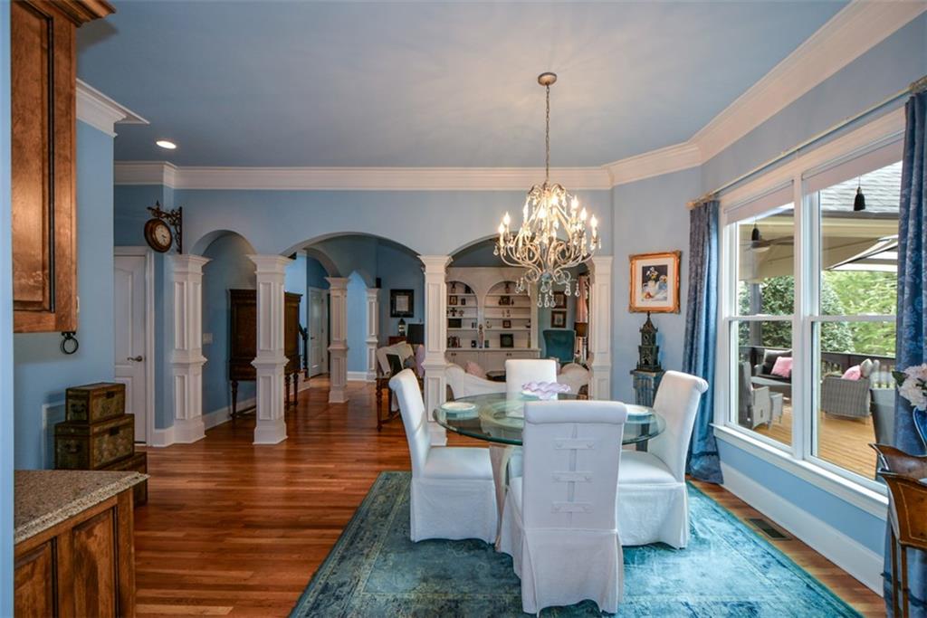 3435 Hidden Shoals Road Northeast Buford, GA 30519 - Photo 36 of 108 a view of a dining room with furniture window and outside view