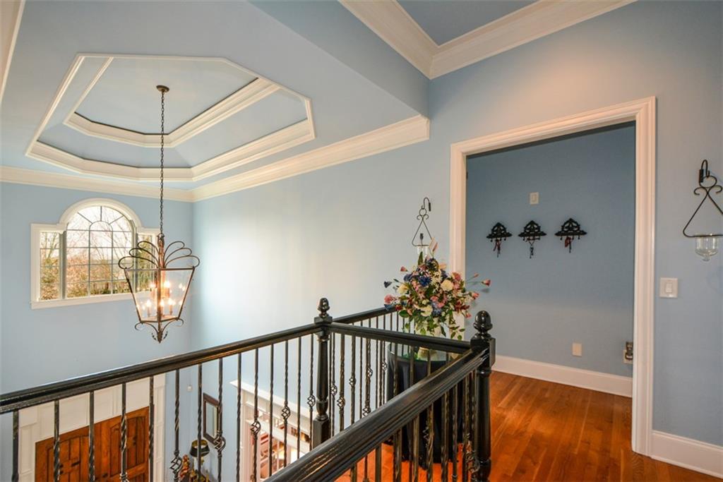 3435 Hidden Shoals Road Northeast Buford, GA 30519 - Photo 45 of 108 a view of entryway and hall with wooden floor