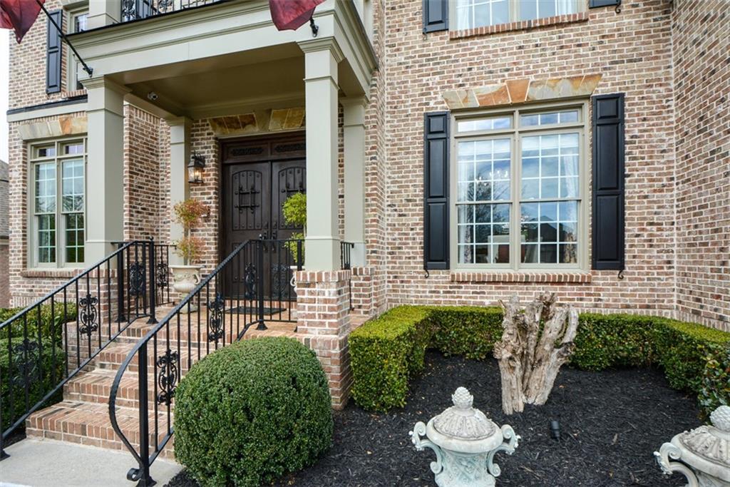 3435 Hidden Shoals Road Northeast Buford, GA 30519 - Photo 5 of 108 a front view of a house