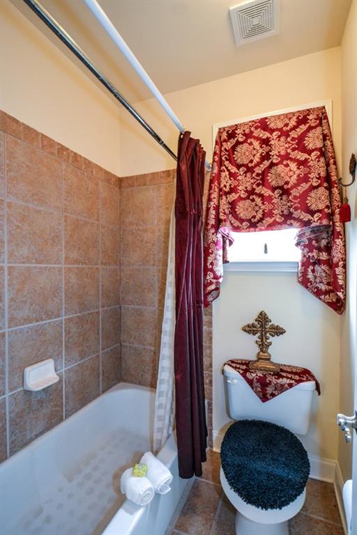 3435 Hidden Shoals Road Northeast Buford, GA 30519 - Photo 63 of 108 a bathroom with a toilet and a shower