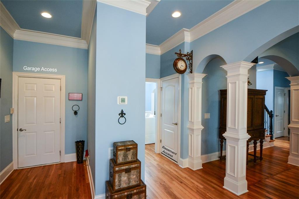3435 Hidden Shoals Road Northeast Buford, GA 30519 - Photo 70 of 108 a view of a hallway with wooden floor and closet