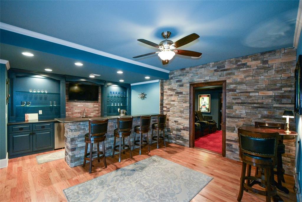 3435 Hidden Shoals Road Northeast Buford, GA 30519 - Photo 73 of 108 a view of a dining room with furniture