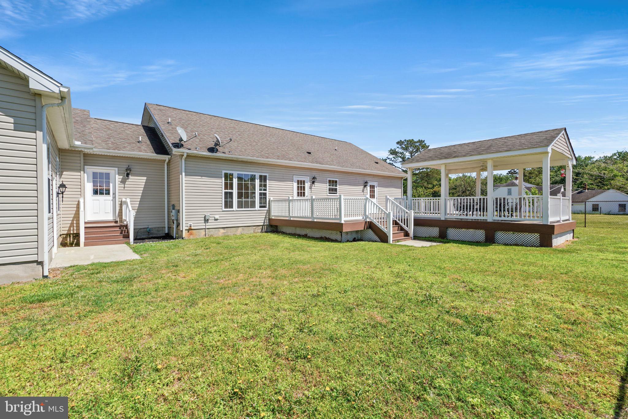 32444 Rehobeth Road Pocomoke City, MD 21851 - Photo 5 of 48 Backyard deck, rear entrance