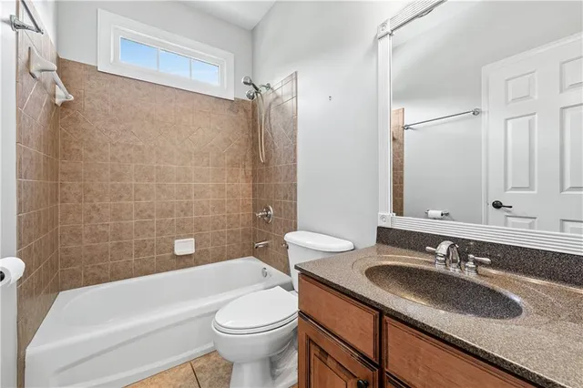 a view of hallway with wooden floor