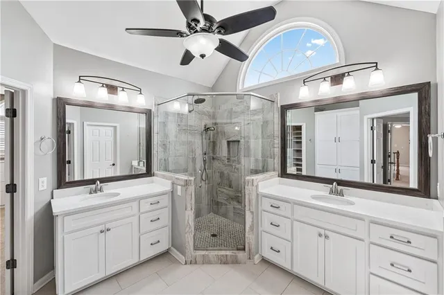 a kitchen with stainless steel appliances granite countertop a stove and a refrigerator