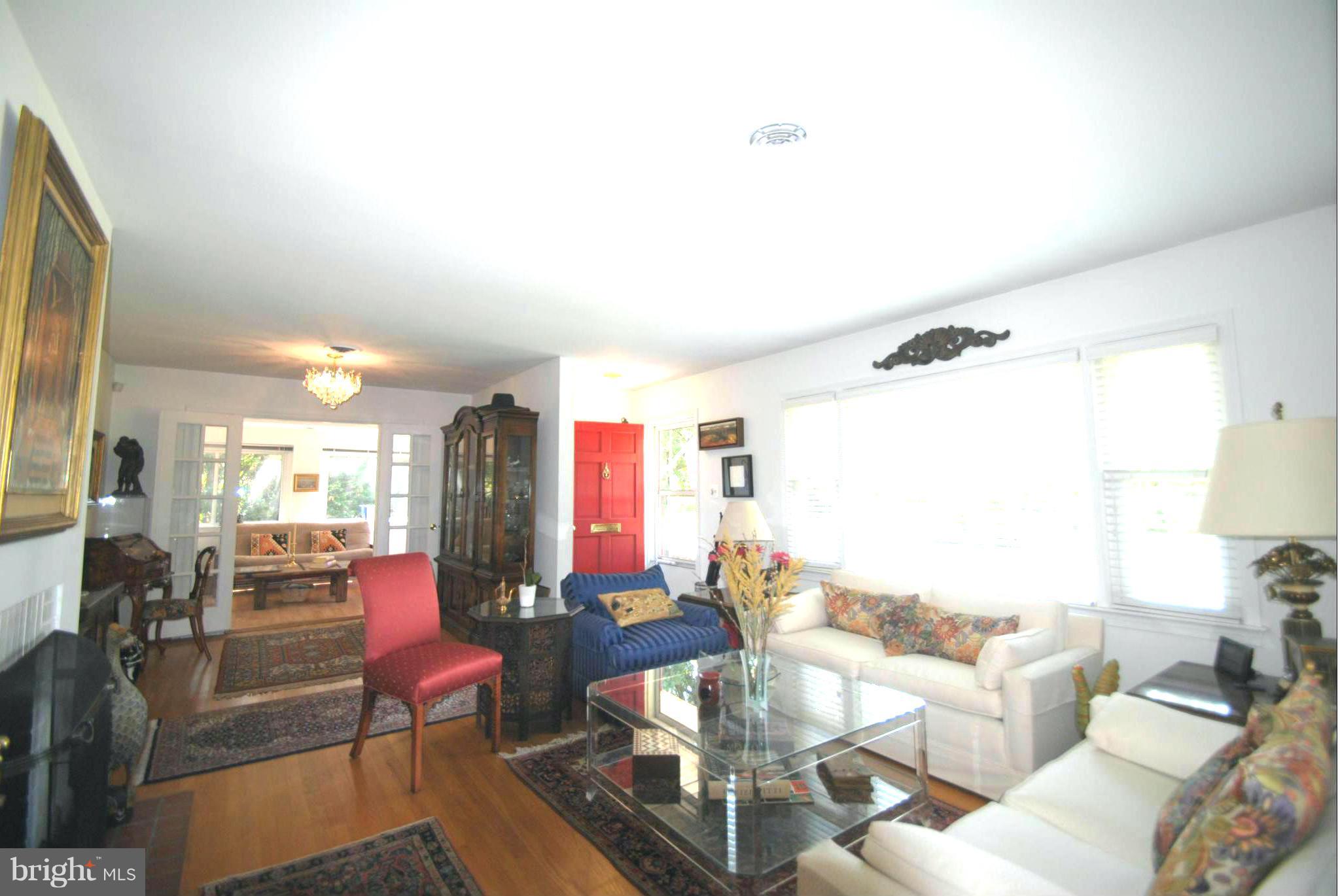 7921 Bainbridge Road Alexandria, VA 22308 - Photo 2 of 30 a living room with furniture and a large window