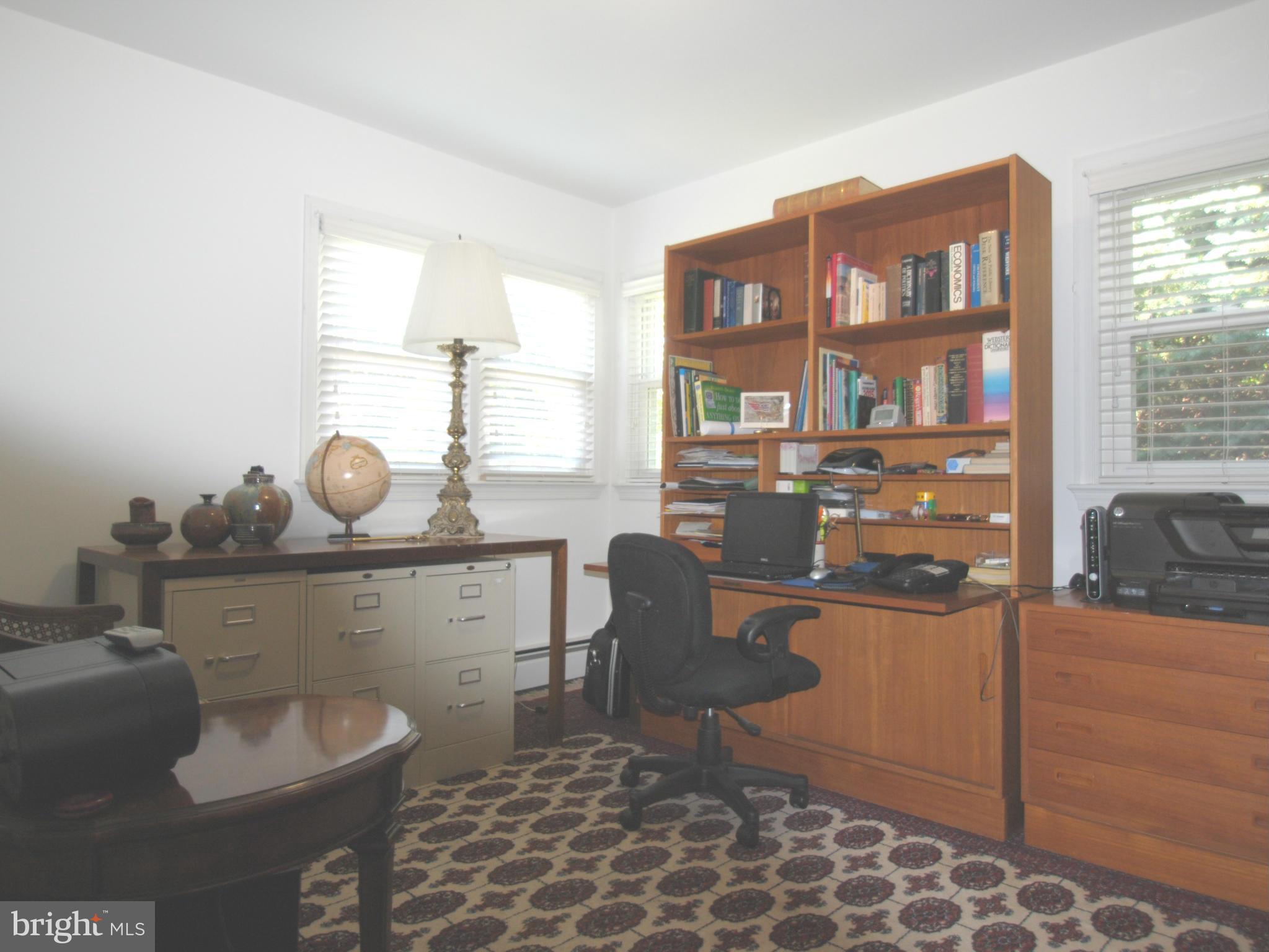 7921 Bainbridge Road Alexandria, VA 22308 - Photo 15 of 30 a living room with furniture and a window