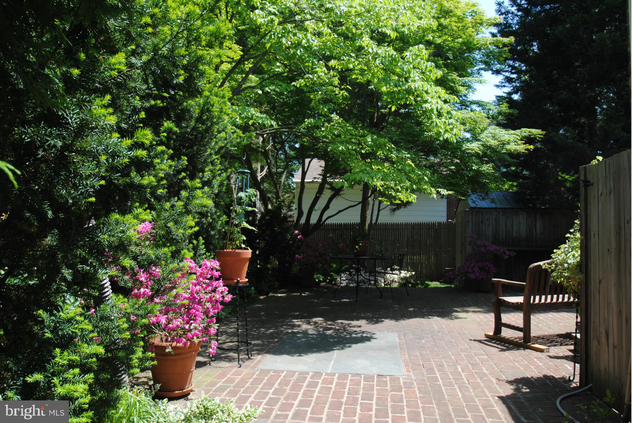 7921 Bainbridge Road Alexandria, VA 22308 - Photo 24 of 30 a view of a bench in a garden