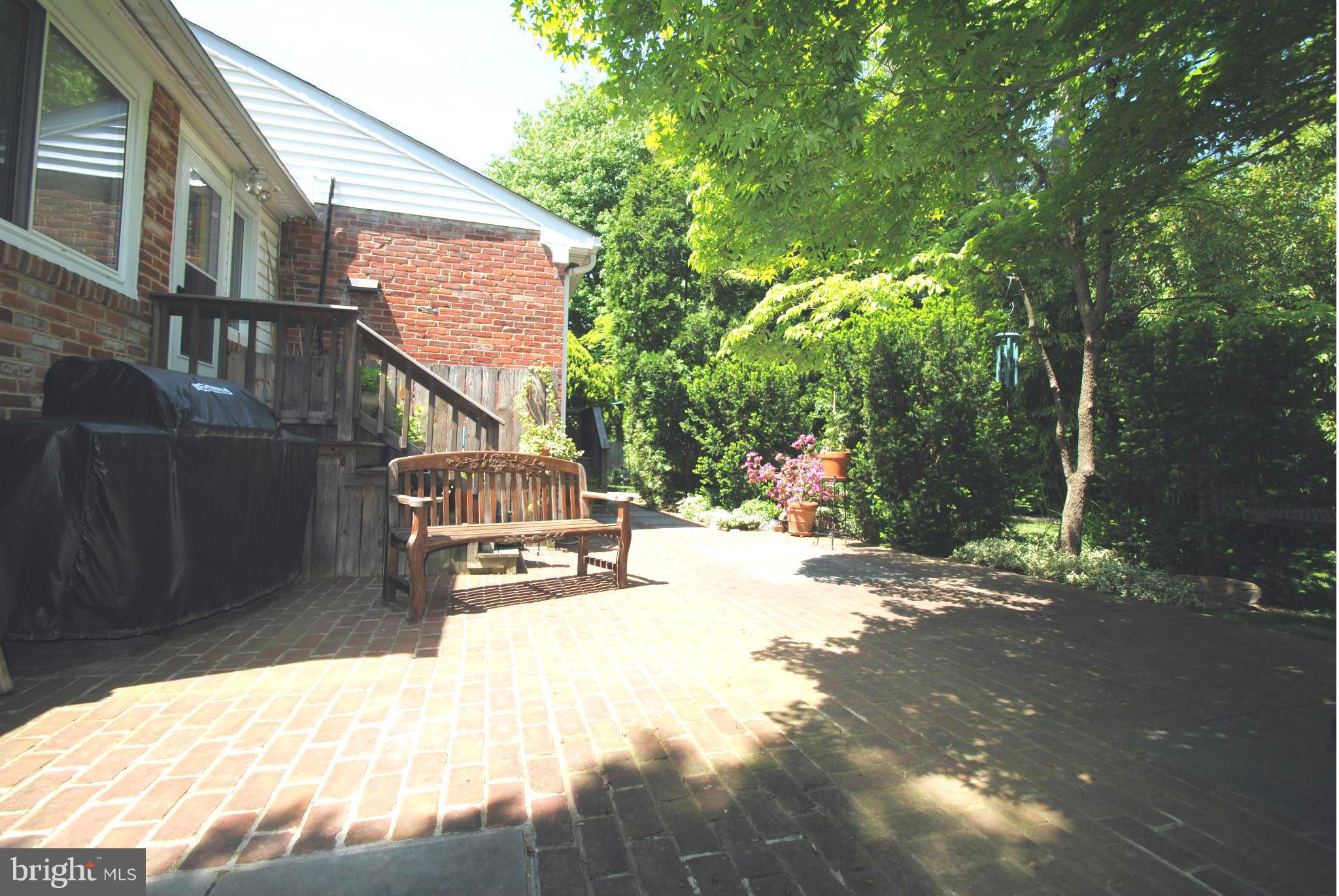 7921 Bainbridge Road Alexandria, VA 22308 - Photo 26 of 30 a house with trees in front of it
