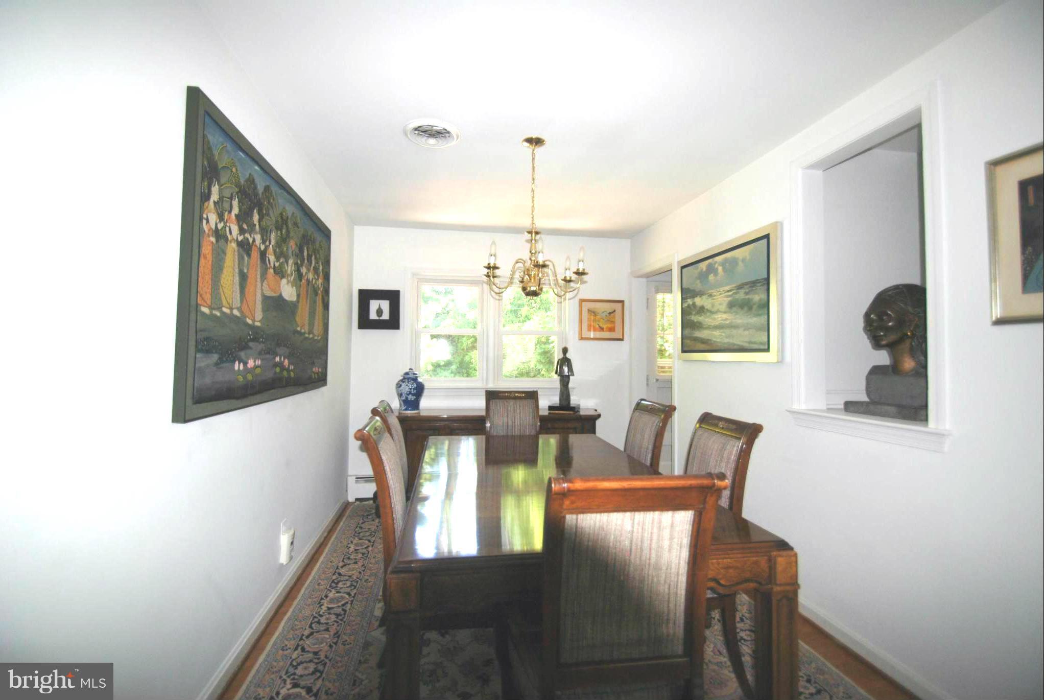 7921 Bainbridge Road Alexandria, VA 22308 - Photo 4 of 30 a view of a dining room with furniture and window