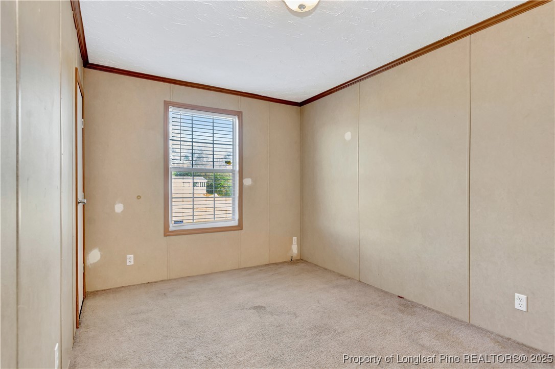 193 Fork Pine Road Lumberton, NC 28358 - Photo 31 of 40 a view of an empty room with a window