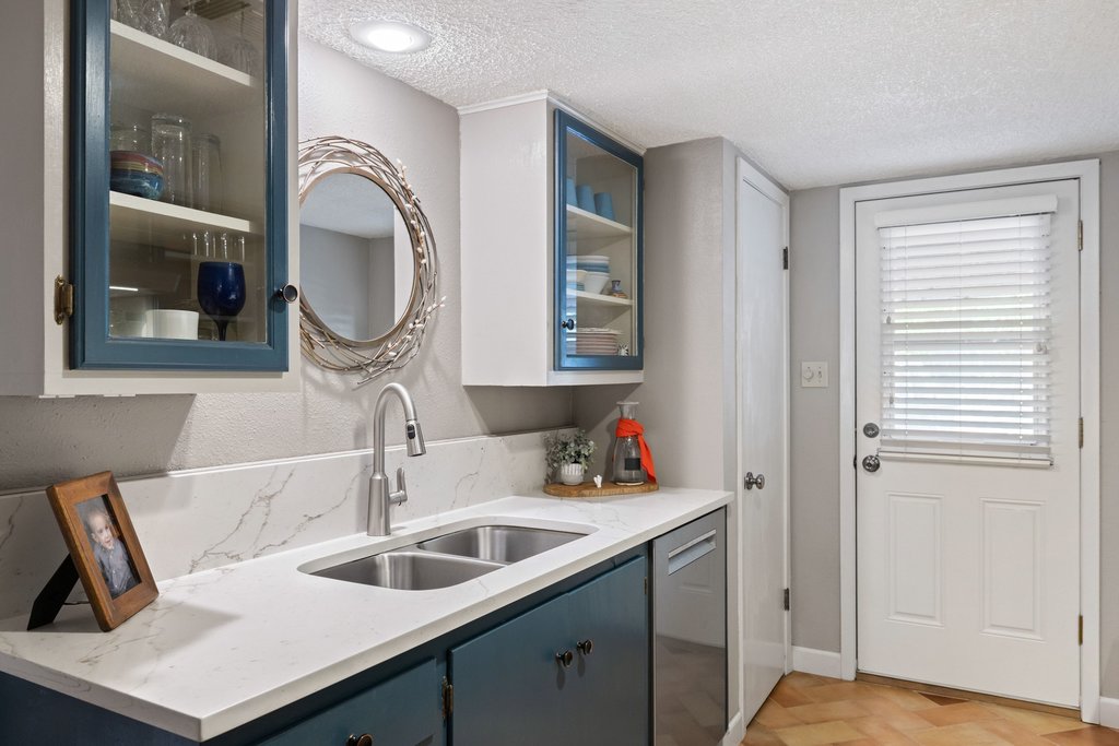 3500 Enfield Road, Unit E Austin, TX 78703 - Photo 22 of 40 Style meets practicality featuring a curated pantry and seamless transitions to the terrace.