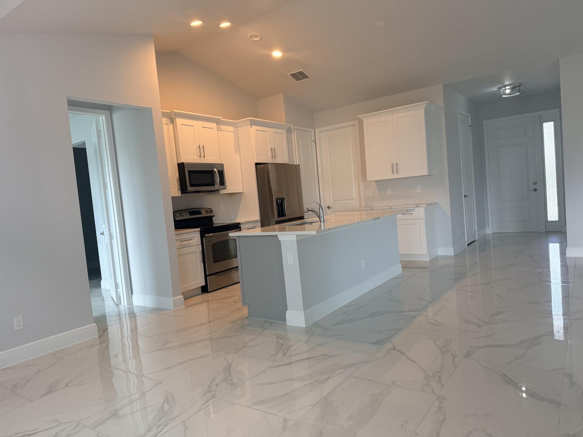 5673 Northwest Whitecap Road Port St. Lucie, FL 34986 - Photo 9 of 31 f47b7cea-7076-4897-9e85-86982c5bd413