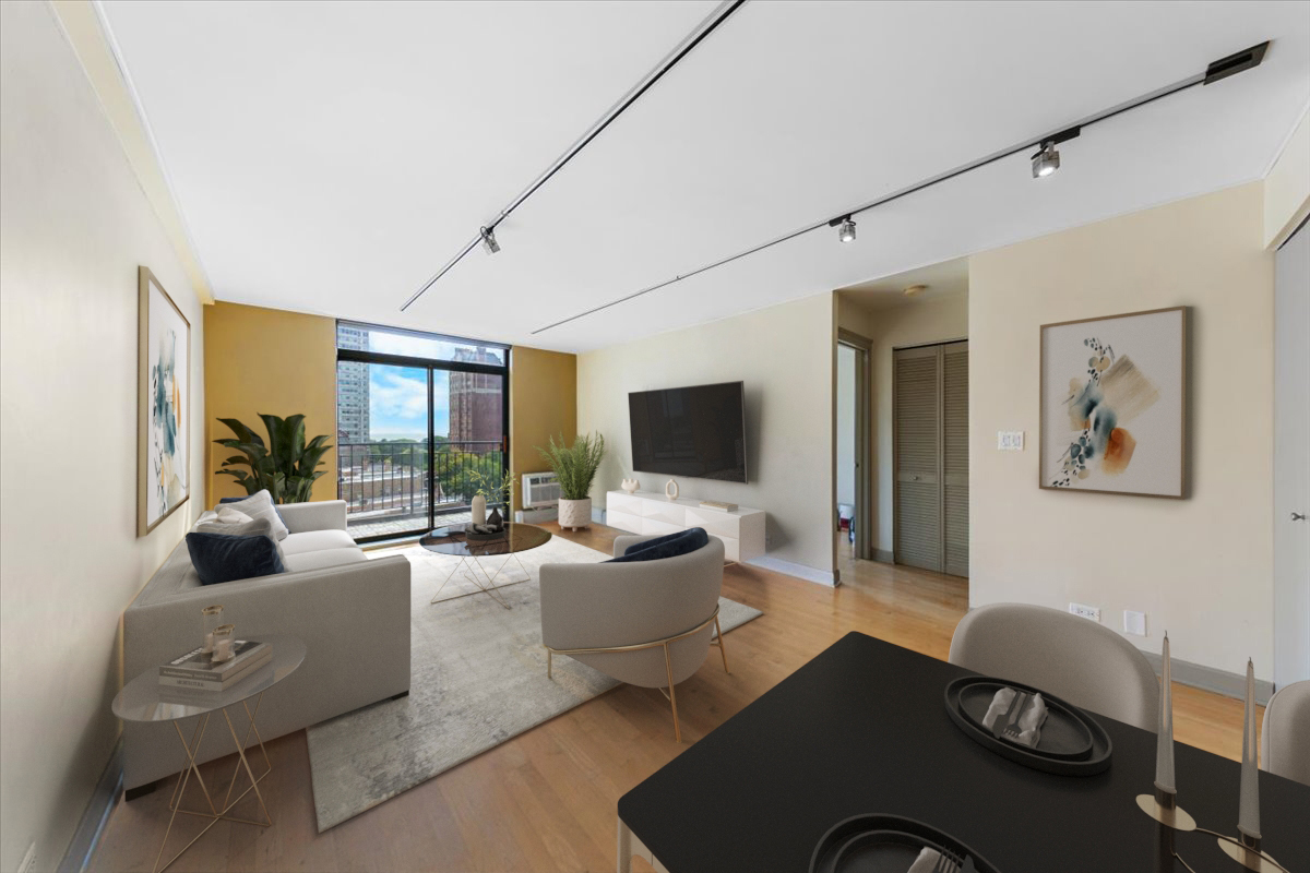 3900 North Pine Grove Avenue, Unit 910 Chicago, IL 60613 - Photo 4 of 18 a living room with furniture and a flat screen tv