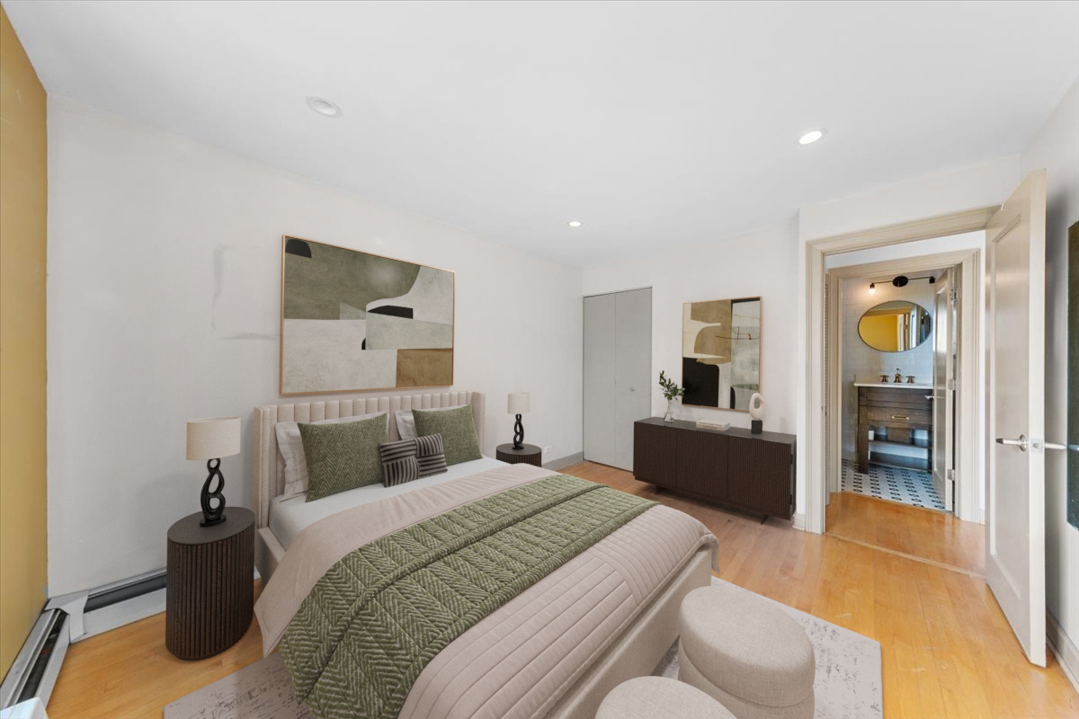 3900 North Pine Grove Avenue, Unit 910 Chicago, IL 60613 - Photo 6 of 18 a bedroom with a bed and a couch