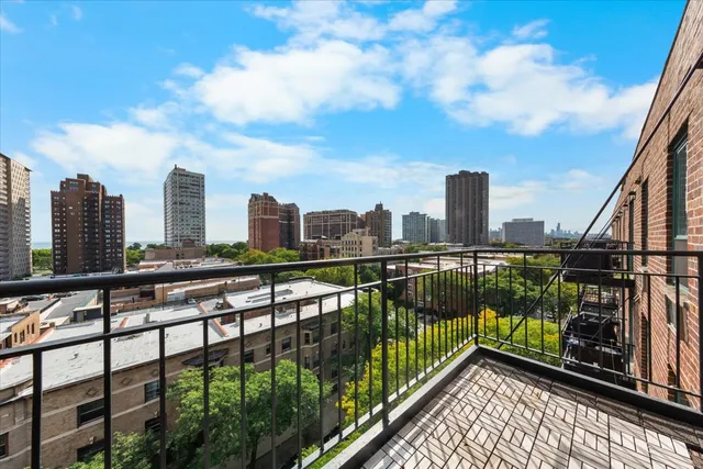 a view of a balcony with city view