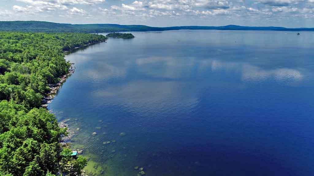 134 Sandy Beach Road Danforth, ME 04424 - Photo 2 of 88 aerial-drone-east-grand-lak