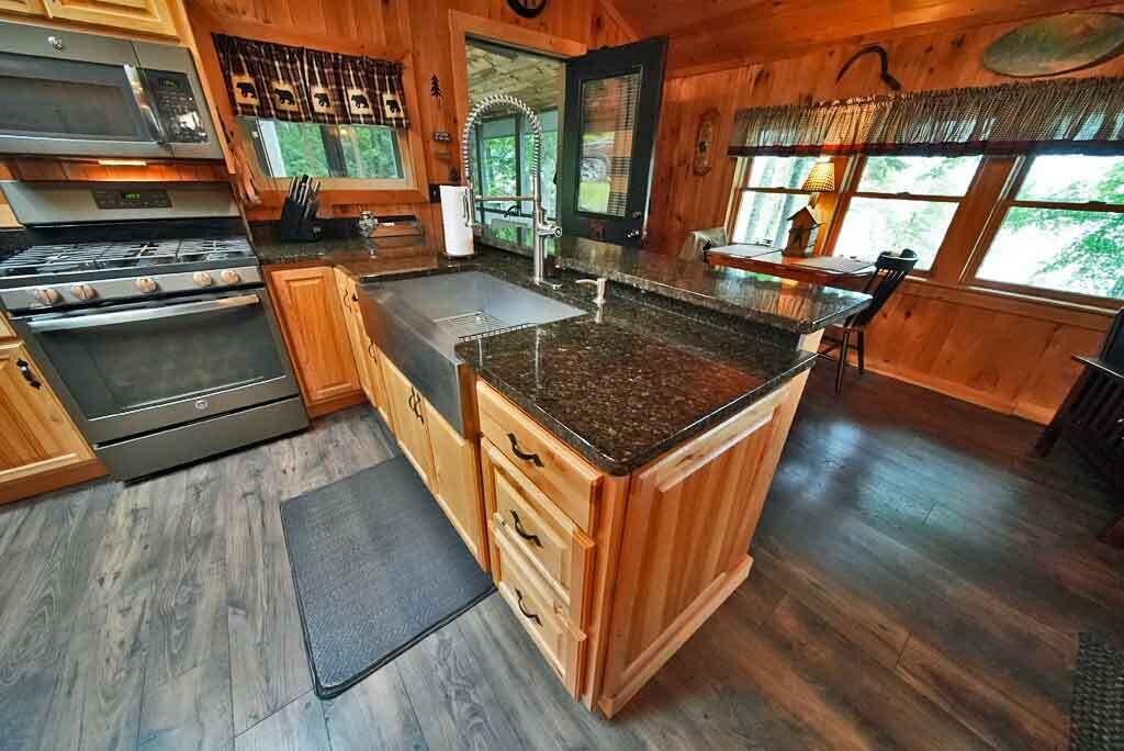 134 Sandy Beach Road Danforth, ME 04424 - Photo 30 of 88 me-kitchen-hickory-cabinet
