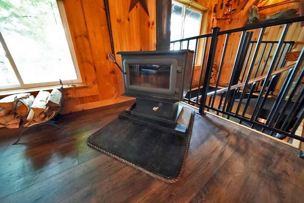 134 Sandy Beach Road Danforth, ME 04424 - Photo 32 of 88 woodstove-living-room