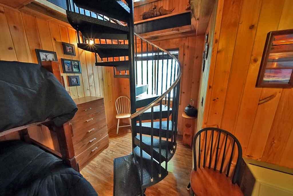 134 Sandy Beach Road Danforth, ME 04424 - Photo 42 of 88 circular-stairway-lake-home