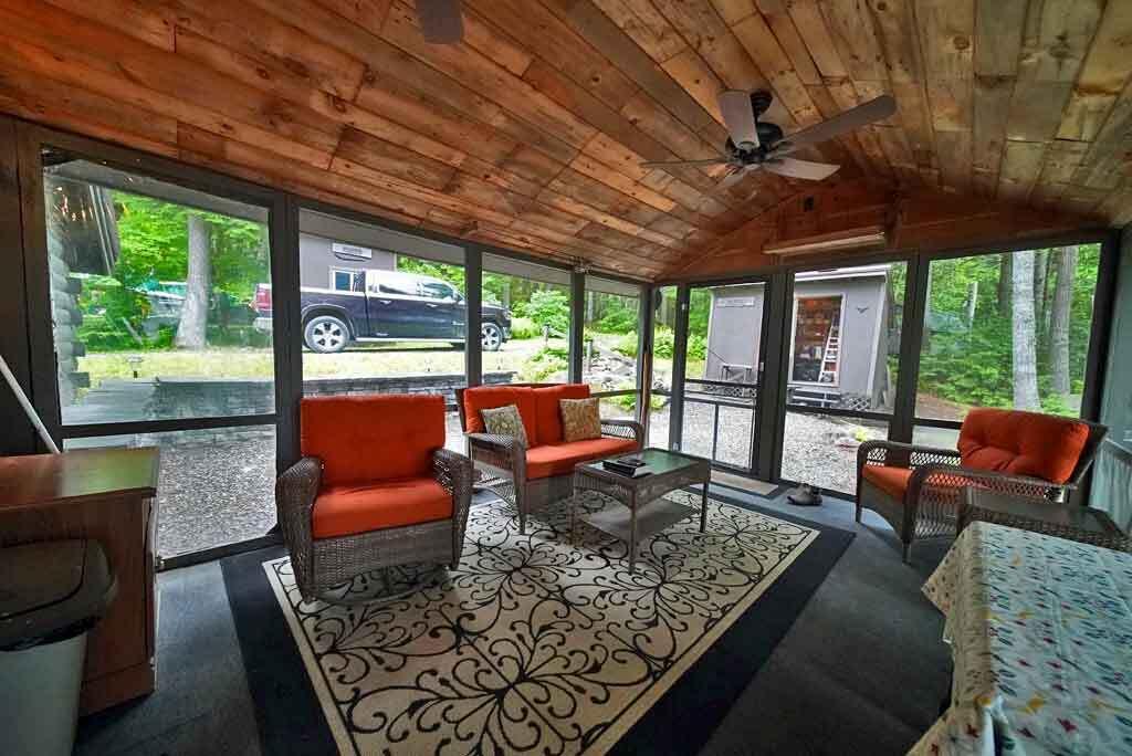 134 Sandy Beach Road Danforth, ME 04424 - Photo 52 of 88 screened-porch-home-lake