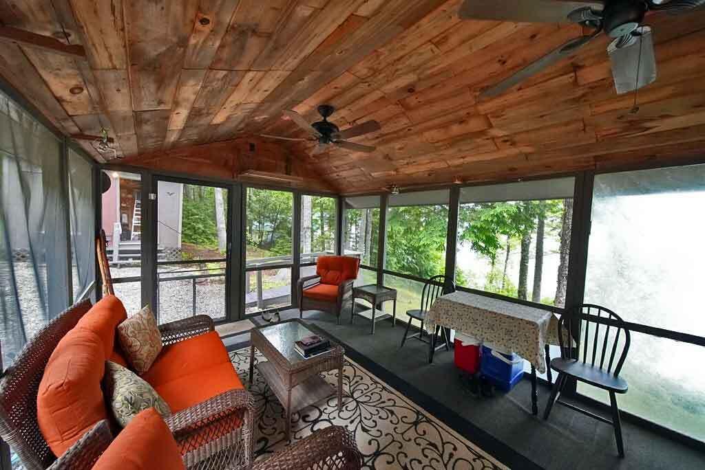 134 Sandy Beach Road Danforth, ME 04424 - Photo 53 of 88 screened-porch-lake-home