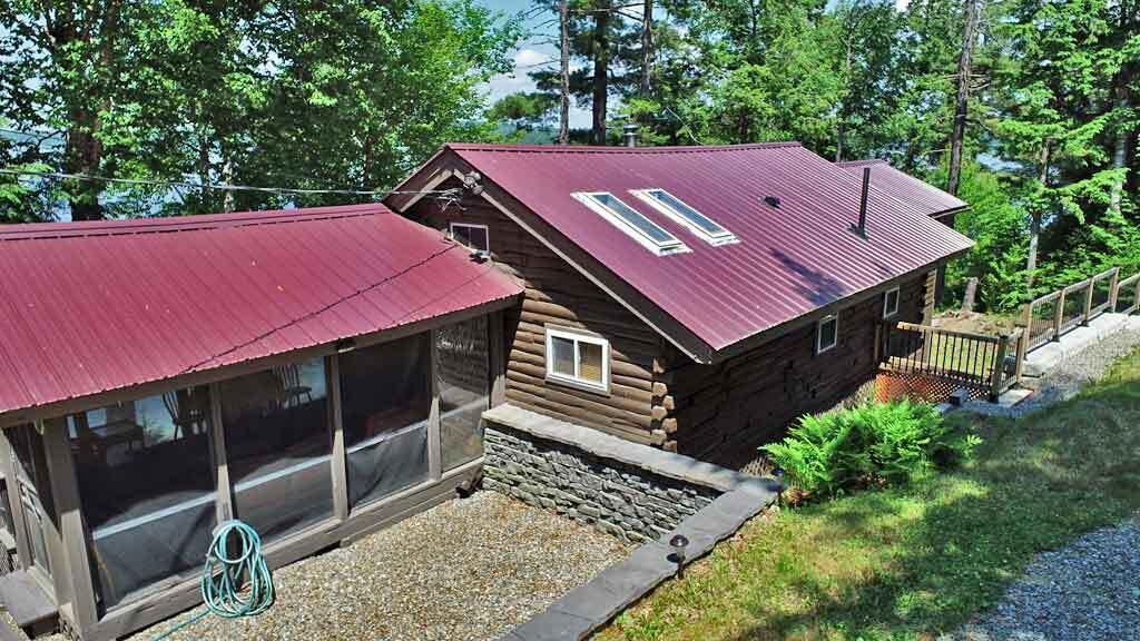 134 Sandy Beach Road Danforth, ME 04424 - Photo 7 of 88 log-lake-home-east-grand