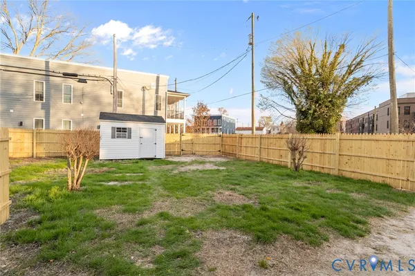 a view of a back yard of the house