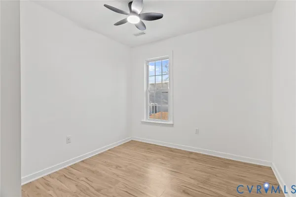 a front view of a house with a gate