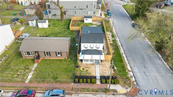 an aerial view of a city with lots of residential buildings
