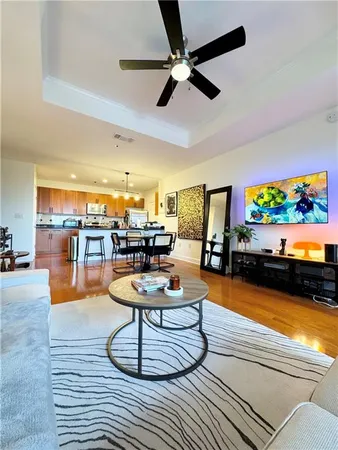 a living room with furniture and a table