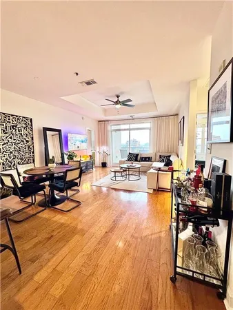 a view of a room with furniture and window