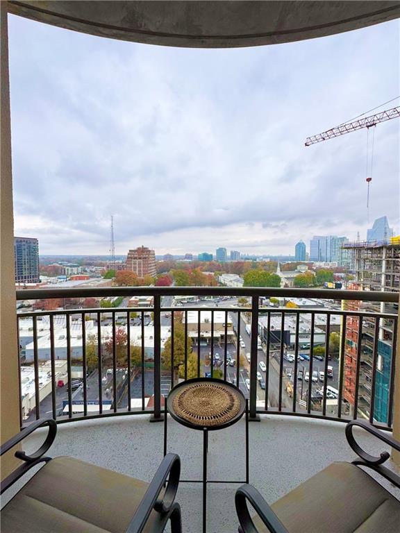 325 East Paces Ferry Road Northeast, Unit 1701 Atlanta, GA 30305 - Photo 32 of 46 a view of a balcony with furniture