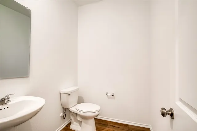 a bathroom with a sink and a toilet