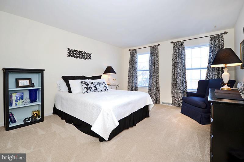 2415 Engle Road Fallston, MD 21047 - Photo 14 of 29 a bedroom with a bed wooden floor and window