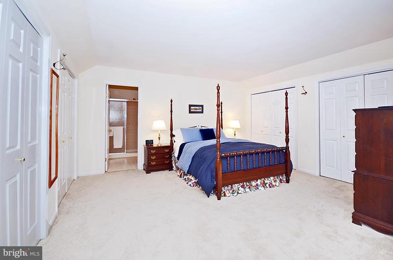 2415 Engle Road Fallston, MD 21047 - Photo 15 of 29 a bedroom with a large bed and a closet