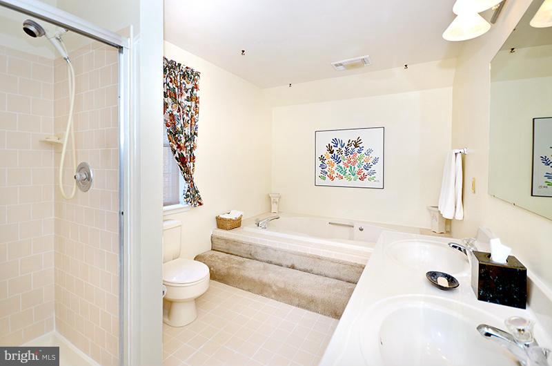 2415 Engle Road Fallston, MD 21047 - Photo 20 of 29 a spacious bathroom with a sink a toilet and a bathtub
