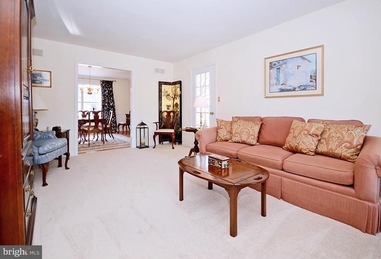 2415 Engle Road Fallston, MD 21047 - Photo 5 of 29 a living room with furniture and a dining table with couch