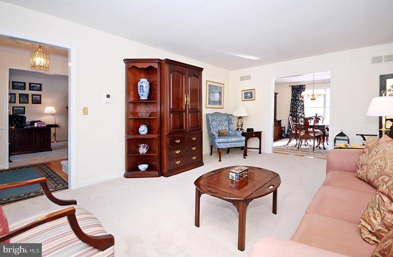 2415 Engle Road Fallston, MD 21047 - Photo 6 of 29 a living room with furniture a table and wooden floor